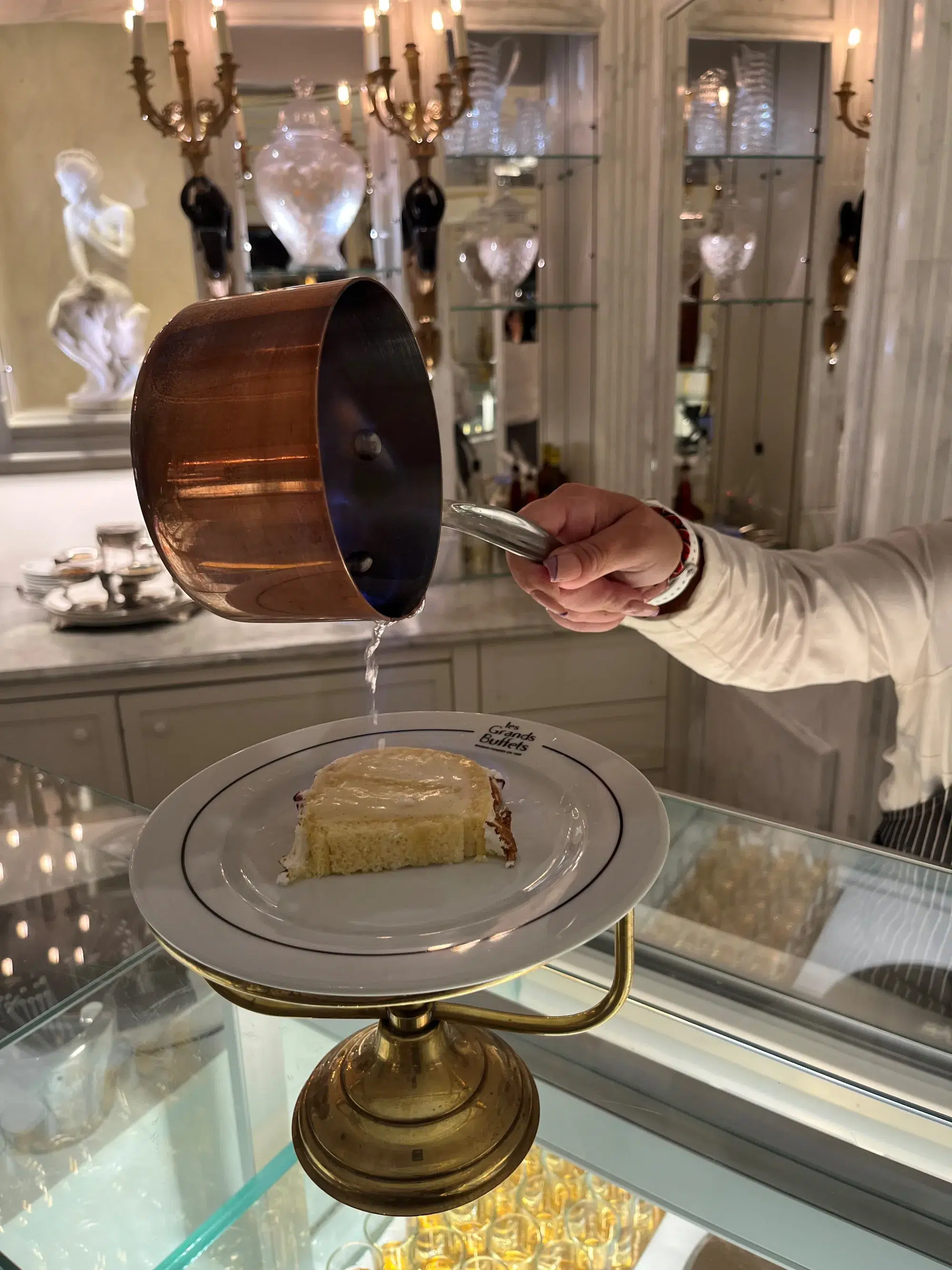 <p>Singeing of the Grand Marnier baked Alaska</p>
